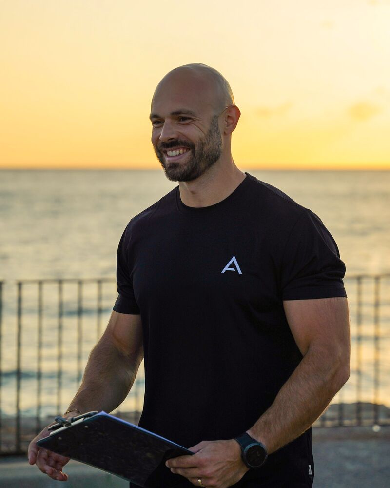Nico, founder of Atlas Fitness, on the seafront at sunrise